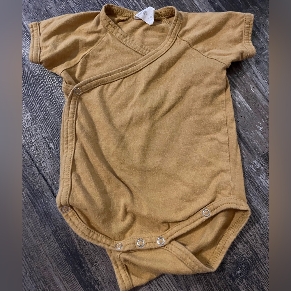 Kate Quinn Onesie